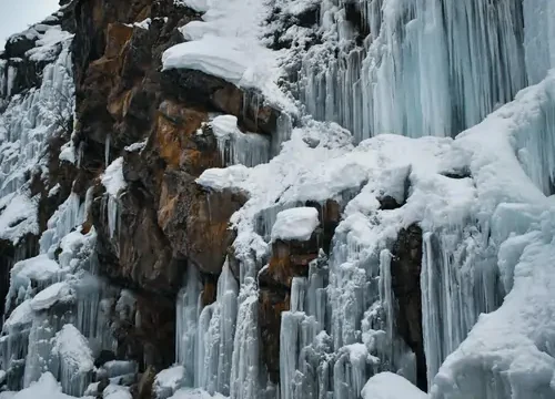 A magical frozen waterfall in winter and a cascading beauty in summer.